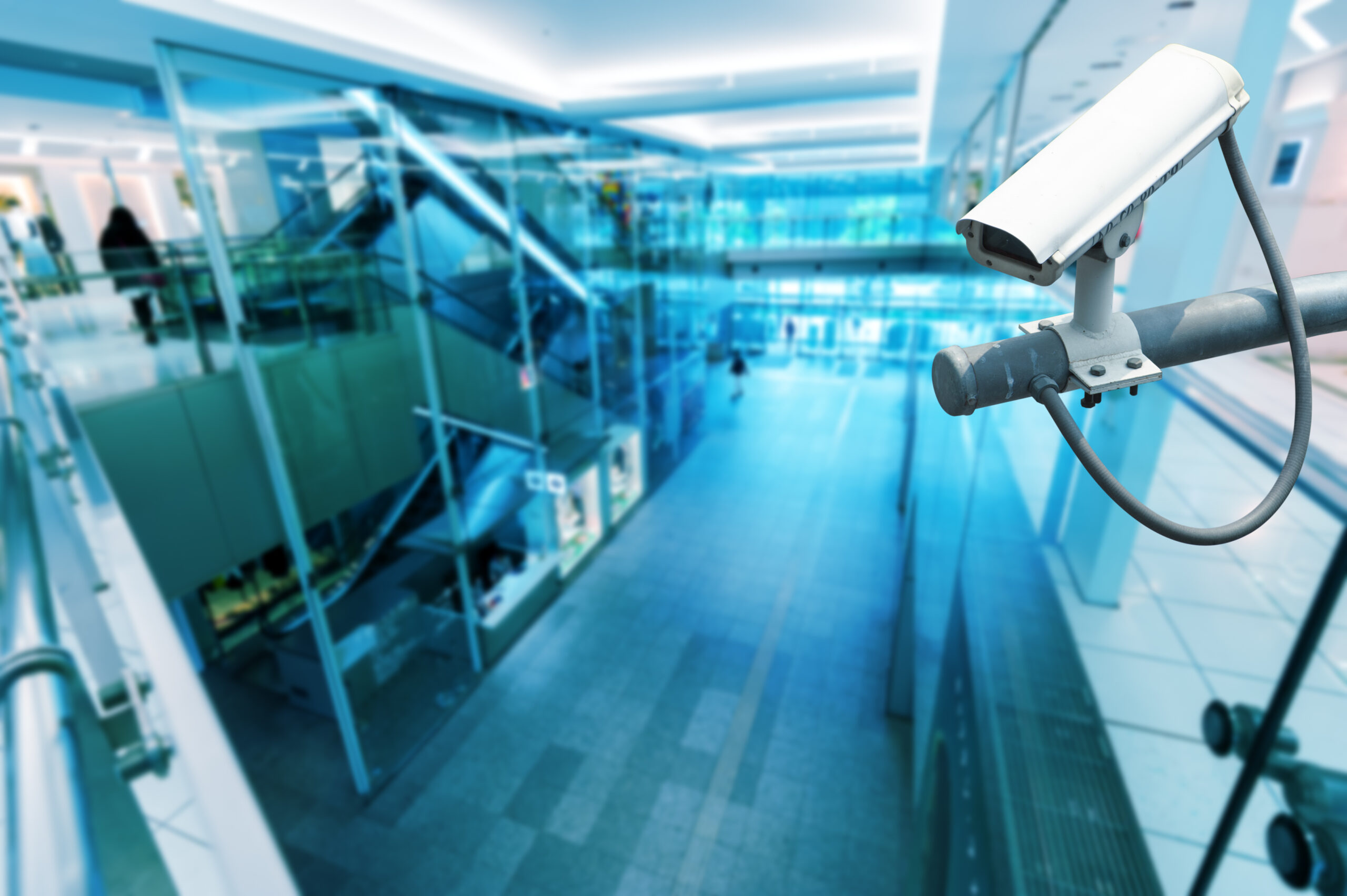 CCTV Camera or surveillance operating in building hightech blue Commercial Security Cameras
