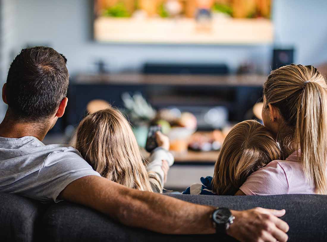 familyfuntime-movienight-2 Family watching TV